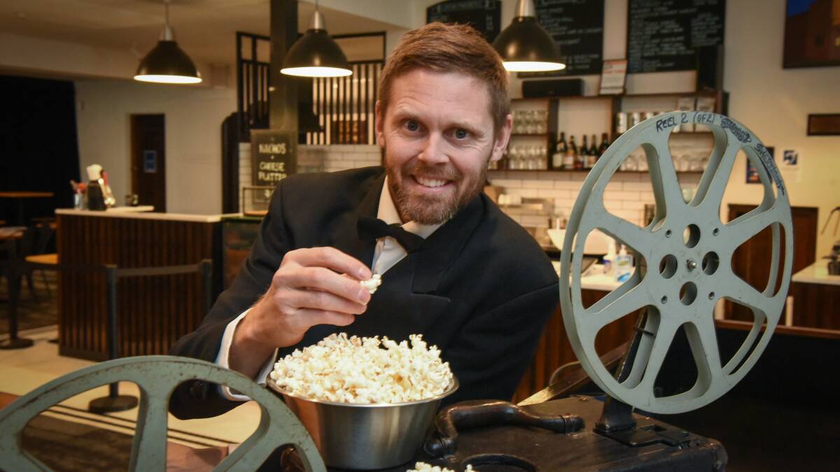 DIM THE LIGHTS: Andrew Quaile of The Star Theatre is firing up the popcorn machine for A Night Out at the Star (at your place). Picture: Paul Scambler