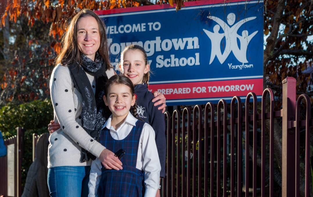 IN SESSION: Youngtown Primary School parent Lynda Rabac, with her children Tahli, grade 5, and Kayla, grade 2 on the first day back at school for term two. Pictures: Phillip Biggs 