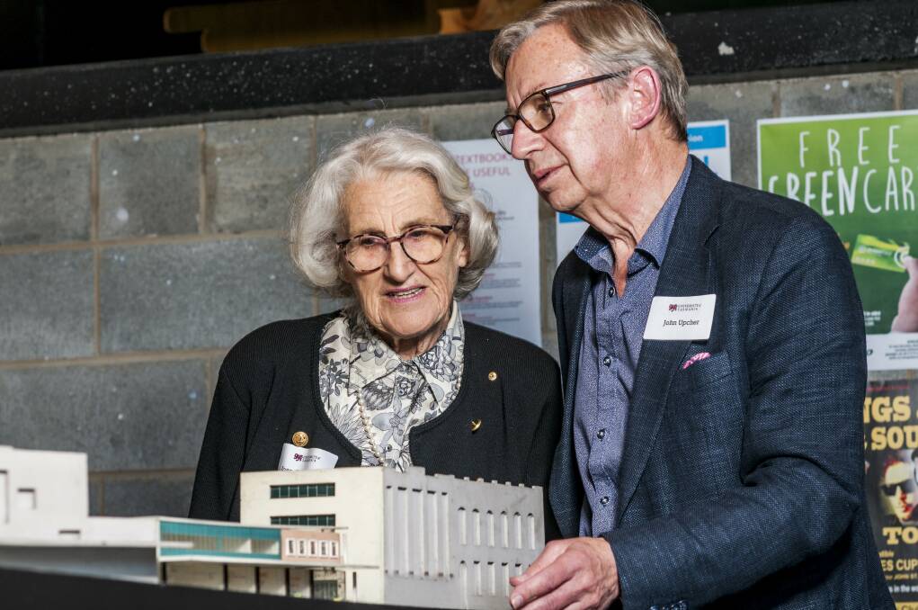 MODEL: Joan Green and John Upcher inspect a model of the Launceston city block that will be reimagined as part of the architecture award at the launch. Picture: Phillip Biggs