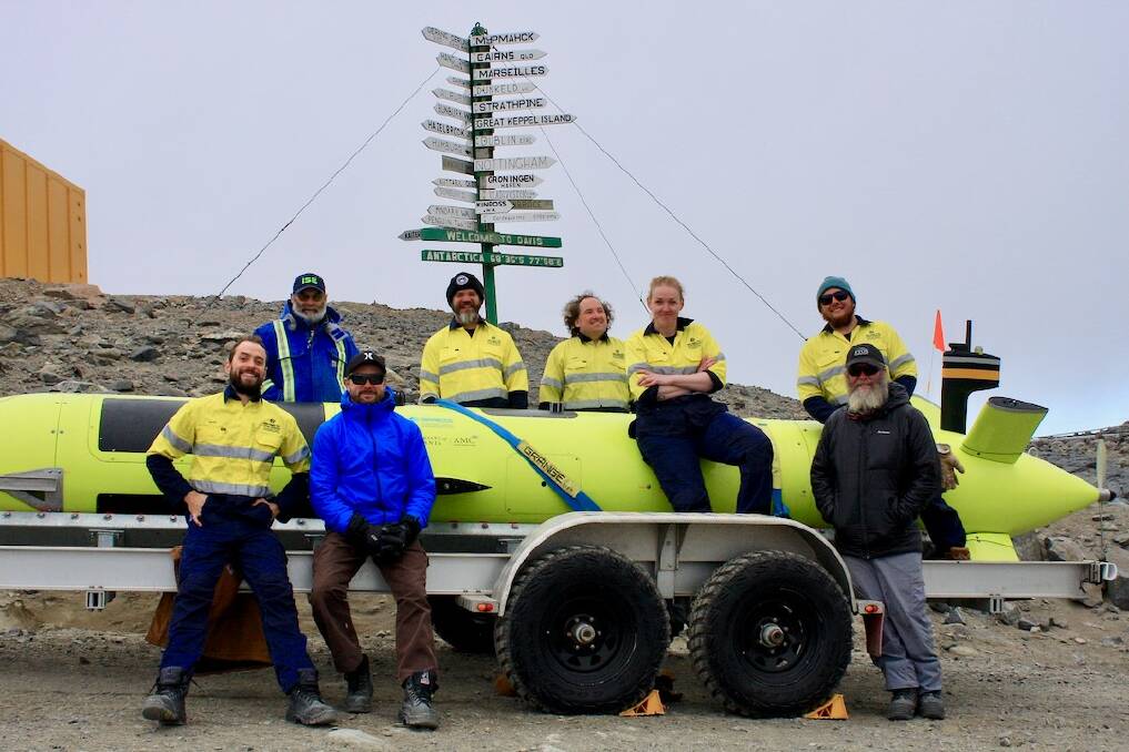 The crew at Antarctica's Davis Station with the AUV.