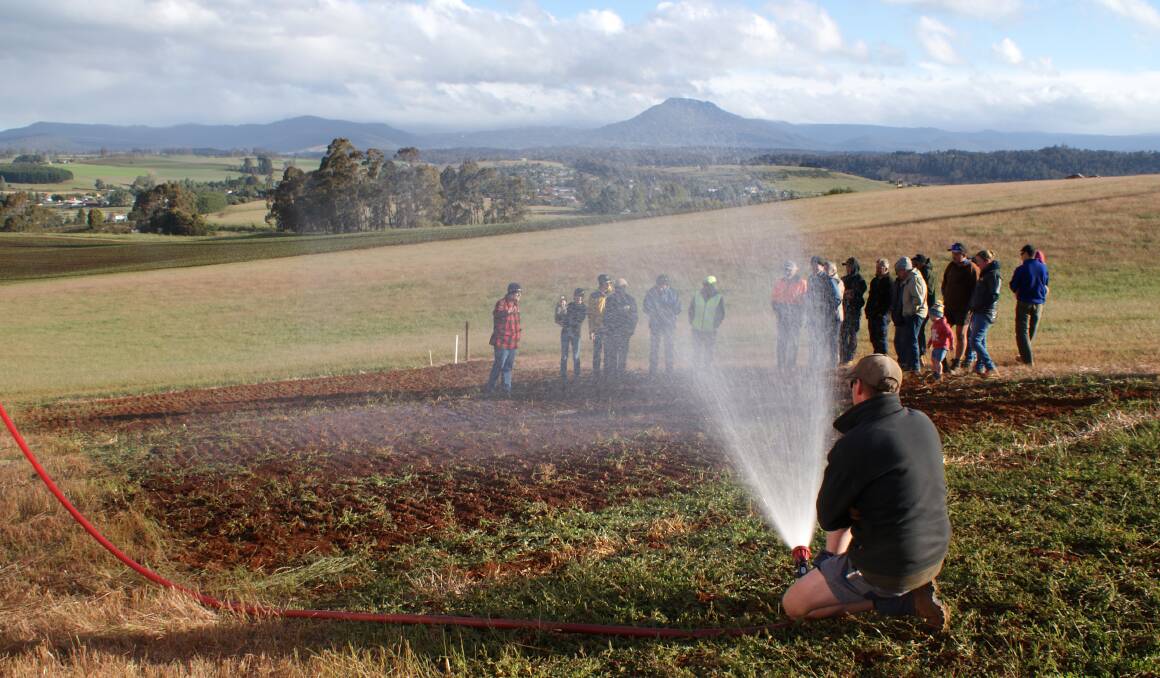 SIMULATION: Water erosion simulation demonstrated to farmers at the NRM North water erosion trial field day at Weetah. Picture: supplied