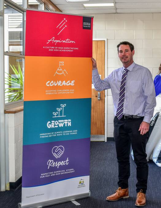 Exeter High School principal Benjamin Frerk with the school's values. Picture: Neil Richardson
