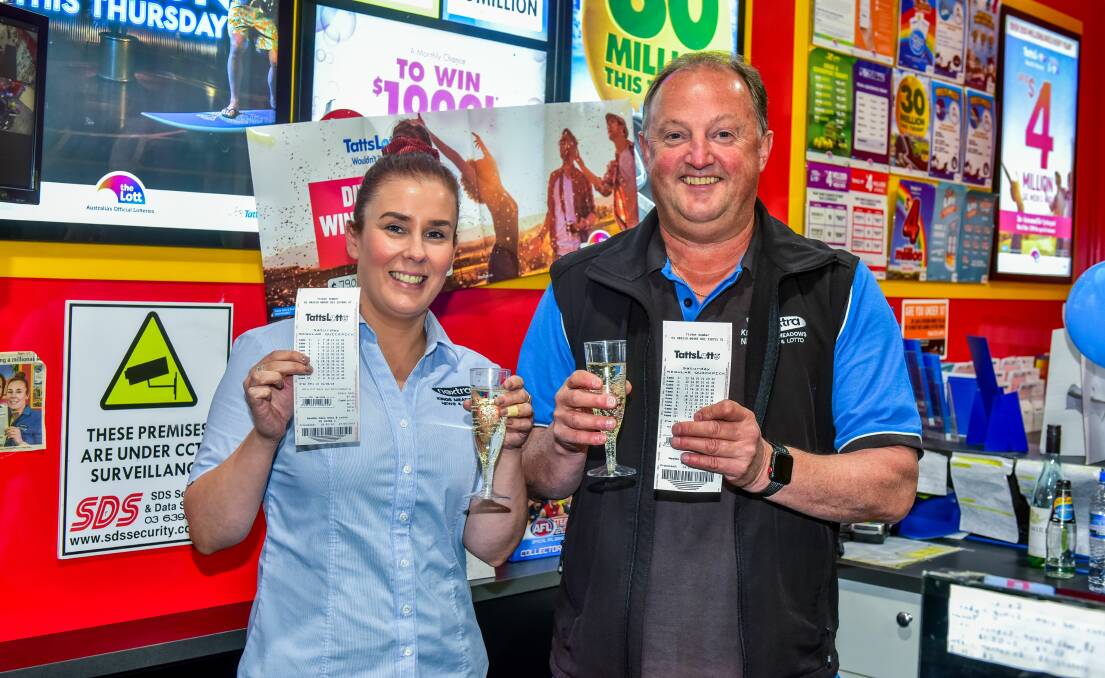 WINNERS: Meadow Mews News and Lotto's Gabi Lyons and Jeff Dolbey celebrate after they sold the latest division one Tattslotto winning ticket. Picture: Neil Richardson
