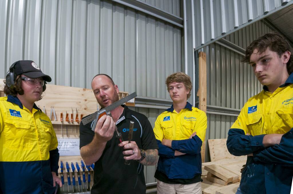 ON THE TOOLS: Tasmanian Building Group Apprenticeship Scheme trainer Brett Mortimer with Coby Triffett (left), Mitchell Blair, and Reece Campton. Picture: Phillip Biggs