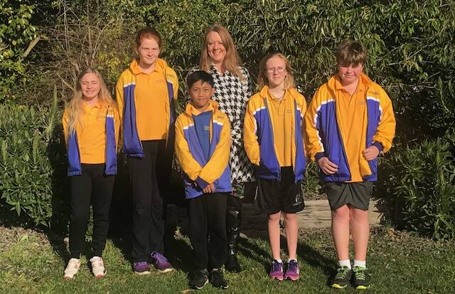 SCHOOL HEROES: Beaconsfield Primary School students Dannie Horton, Layla Seen, Jaymee Lightfoot, Ken Matus and Addison Adams with principal Sharryn Crothers. Picture: supplied