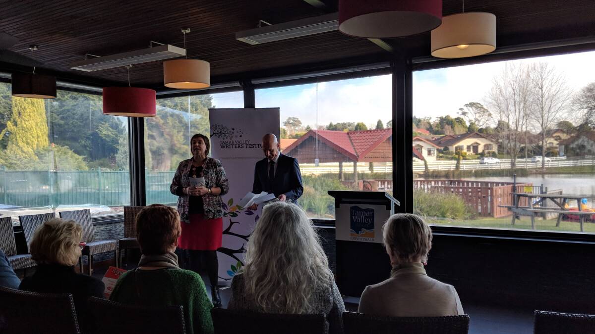 LAUNCH: Tamar Valley Writers Festival committee president Mary Machen and Treasurer Peter Gutwein at the launch of the festival's program.