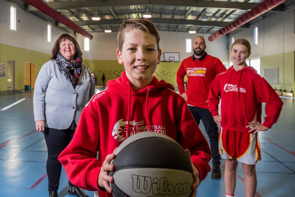 GAME ON: City of Launceston Basketball Club member Will Sattler, president Kane Brewer and Olivia Bender at the Riverside Primary School gym. Picture: Phillip Biggs