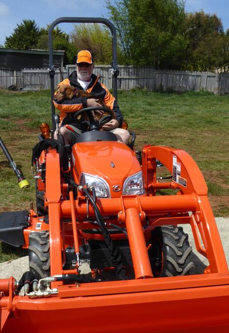 BEST FRIENDS: Brett is often joined by his long-haired and totally blind dachshund on the Kubota as he potters around his property taking care of jobs.
