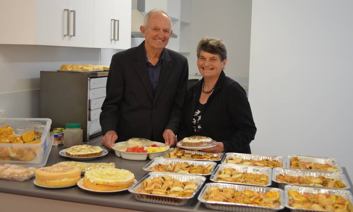 Kevin and Gwen Cuthbertson organising supper for a dance last year.