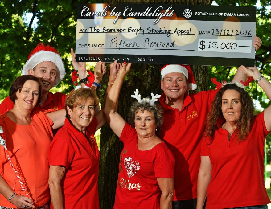 CARING: Rotary Club members Lou Mason, Damien Springer, Susan Nolan, Judy McLean, Danny Gibson and Jane Pybus with the donation. Picture: Scott Gelston. 