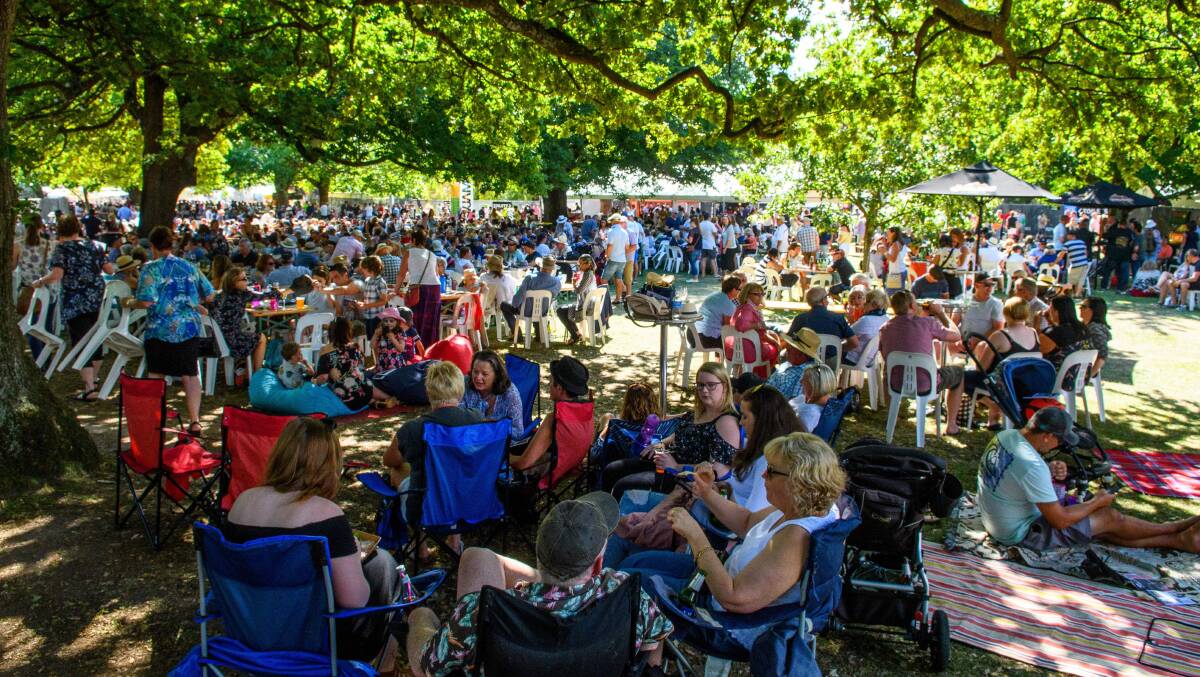 SOAKING UP THE ATMOSPHERE: Crowds enjoying music, food, wine and beer in Launceston's City Park at Festivale's three-day event during 2018. Picture: Scott Gelston