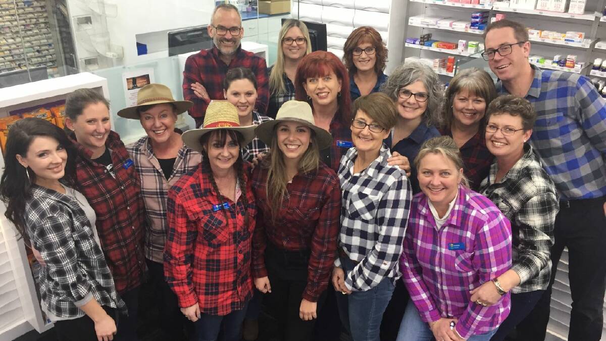 EPIC EVENT: Kings Meadows pharmacy staff dressed up for Flannie for a Farmer fundraiser. Picture: Supplied