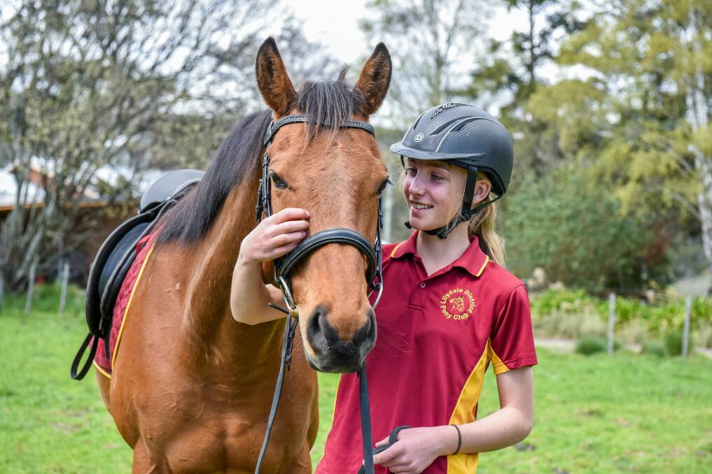 PONY MENTOR: Shannon Kelly with her horse Romeo at Lilydale. Picture: Neil Richardson