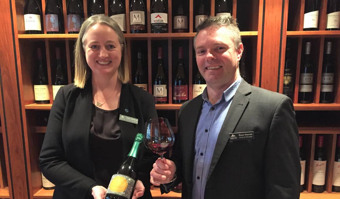FINEST WINES IN THE STATE: Country Club food & beverage manager Robyn McInerney and general manager Ross Hannah in Terrace Restaurant's wine room. Picture: Johanna Baker-Dowdell