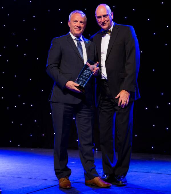 TAKING OFF: Launceston Airport general manager Paul Hodgen accepting the award from association board director Rob Porter. Picture: Supplied