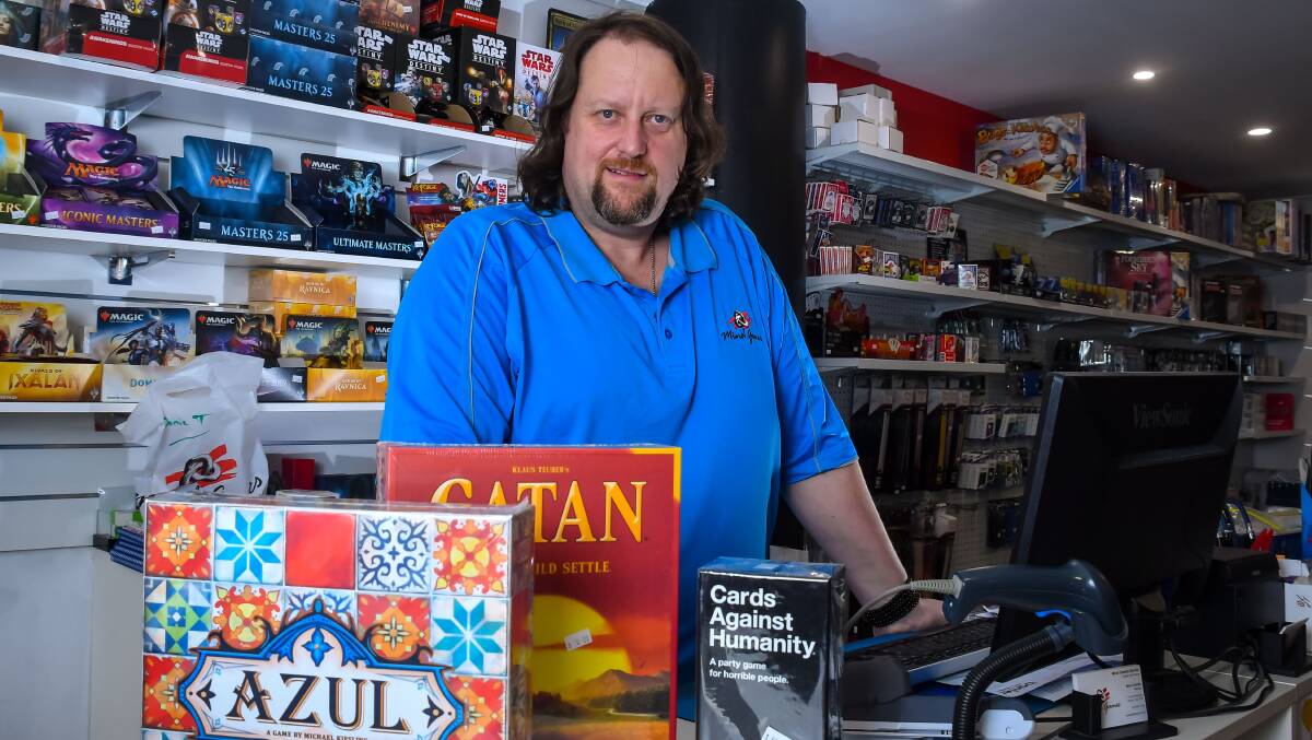 Mind Games owner Matt Costello says table-top board games are experiencing a world resurgence and are not just for nerds. Picture: Simon Sturzaker