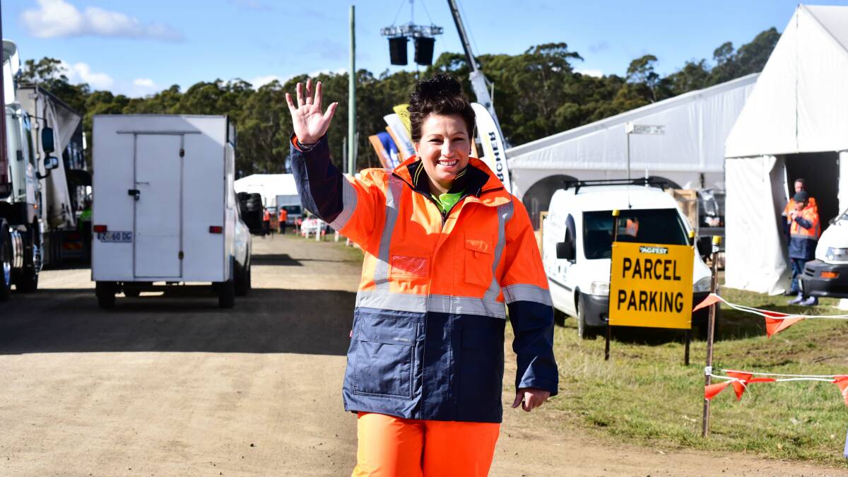 GRAB THE GUMBOOTS: Rachel Knott, from Tasweld Hobart, has her wet weather gear ready for Agfest. The forecast is for rain on Friday and Saturday. Picture: Neil Richardson