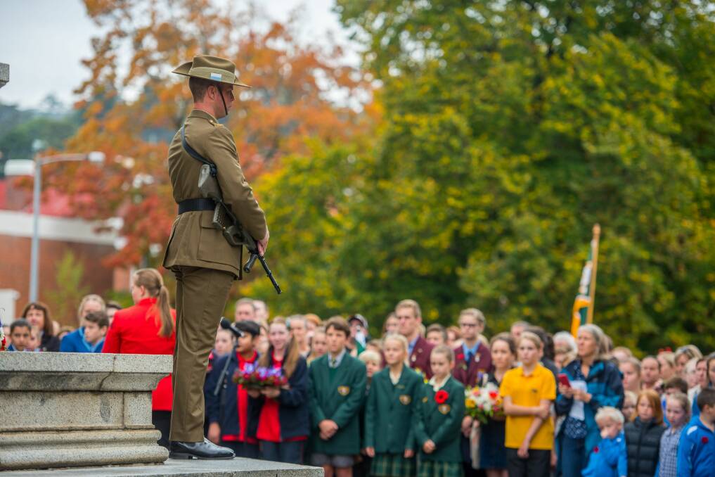 PROFOUND LOSS: Anzac Day 2017 service at Launceston cenotaph, with participants spanning multiple generations. Picture: Scott Gelston