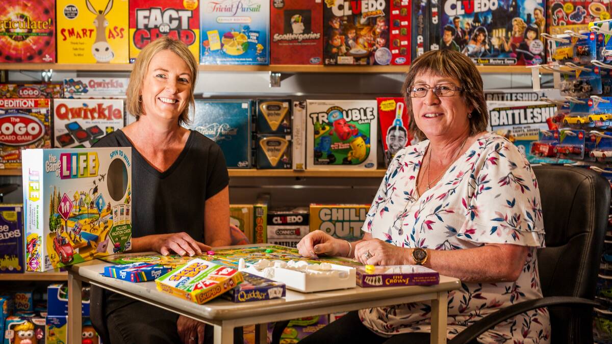 ALL A GAME: Gamesworld Plus sales assistant Kim Templar and manager Shirley Clifford. Picture: Phillip Biggs