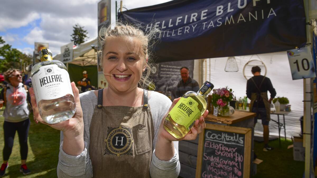 IN THE FAMILY: Hellfire Bluff Distillery events and marketing manager Ruby Daly with vodka her family produces from potatoes they grow at Marion Bay. Picture: Paul Scambler