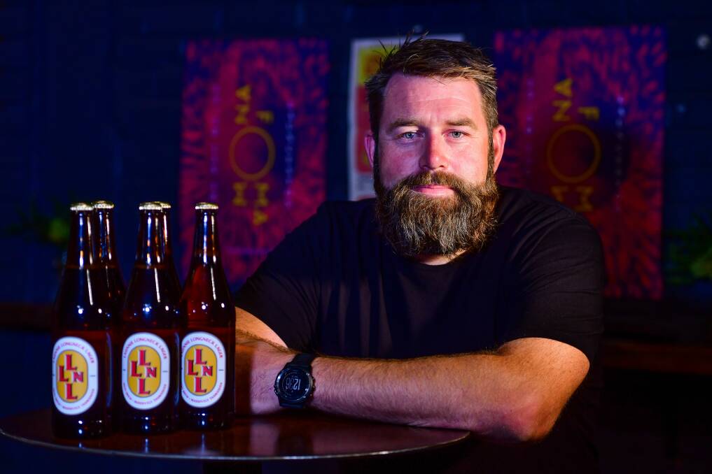 APPROACHABLE BREW: Moo Brew head brewer Dave Macgill with the Launnie Longneck Lager brewed for Mona Foma. Picture: Scott Gelston