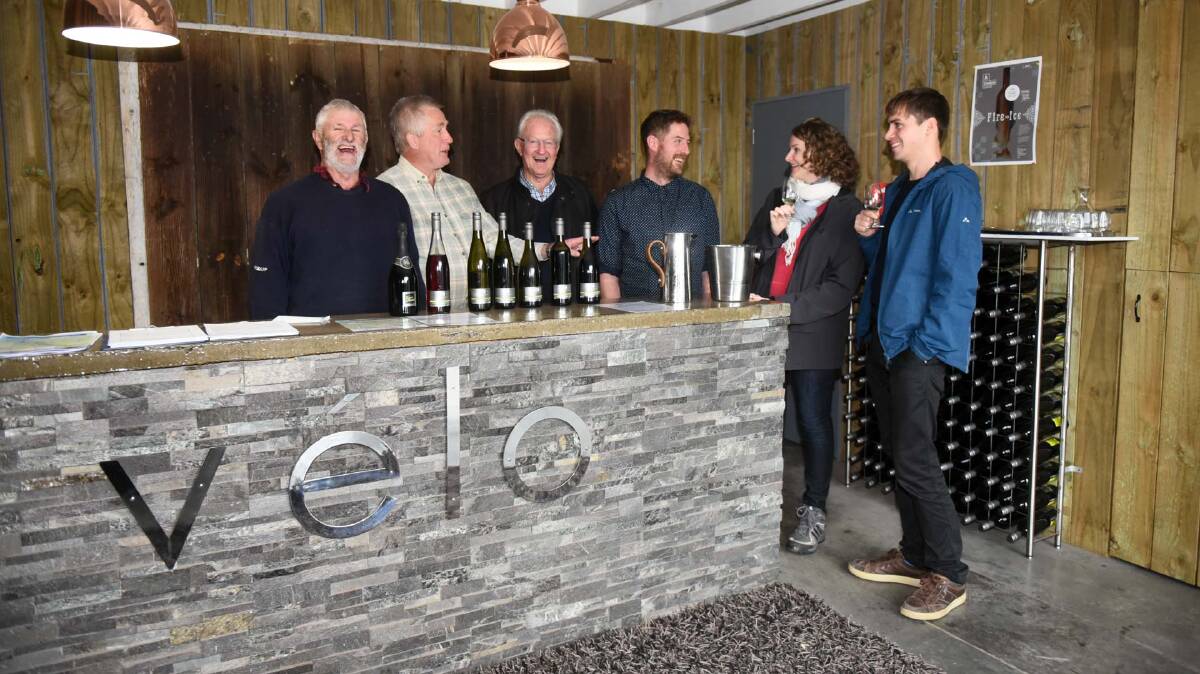 THINK BIG: Consultant Rod Thorpe, Legana Estate owners Peter Bond and Ken Hudson and chef Matt Adams speak with visitors Lis and Jonas Blume of Melbourne about plans for the vineyard. Picture: Neil Richardson.