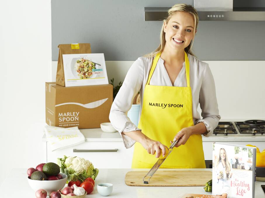 LAUNCHING IN LAUNCESTON: Nutritionist and author Jessica Sepel works on a Marley Spoon meal kit recipe. Picture: Supplied