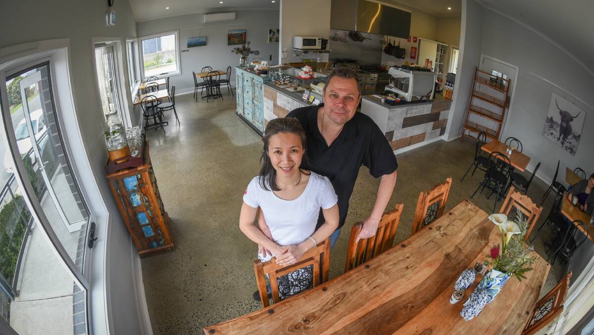 NEW FACES AT THE BEACH: Mark and Bee Long inside their business Singapore Baker’s Cafe, at Gravelly Beach. Picture: Paul Scambler