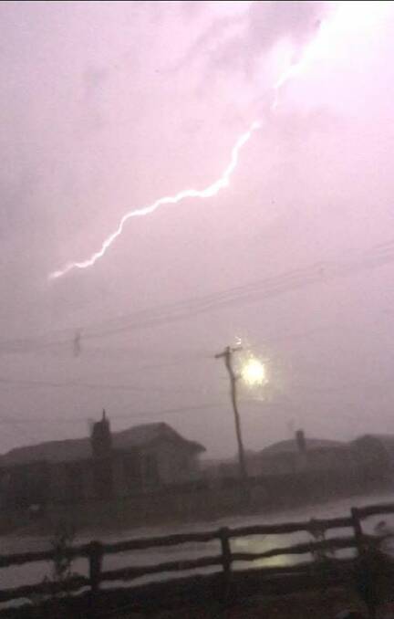 Lightning bolt taken by reader Jake Warren at Mayfield on Sunday night. Picture: Supplied