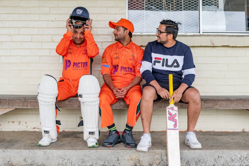Saroj Aryal, Paras Ghimire and Santosh Sharma at a Launceston Nepali Cricket Club match at Exeter. Picture: Phillip Biggs