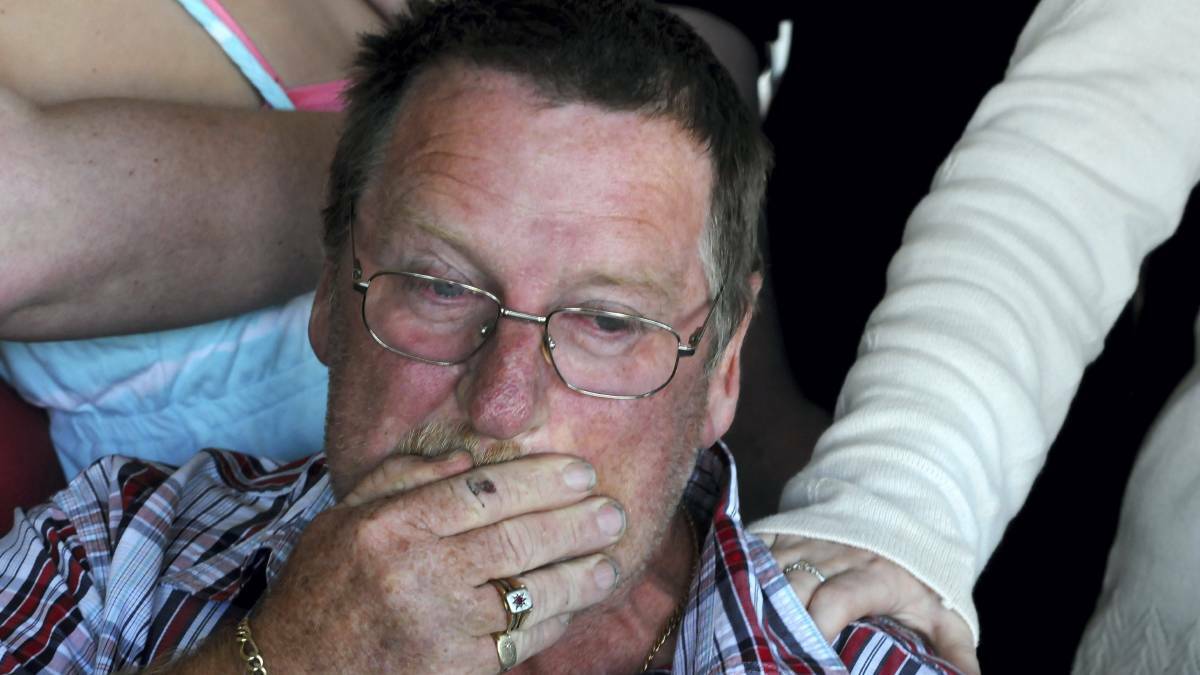 WIDOWER: John Flanagan grieving in the immediate aftermath of his wife's death in 2014. Picture: File