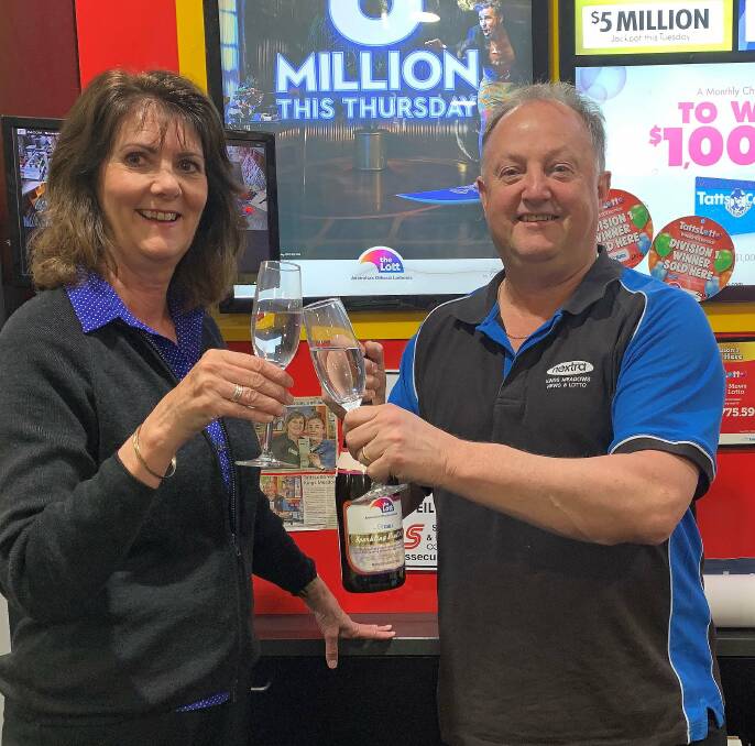 Meadow Mews News & Lotto owner Viv Dobley and fellow news agency employee celebrate the win. Picture: Supplied.