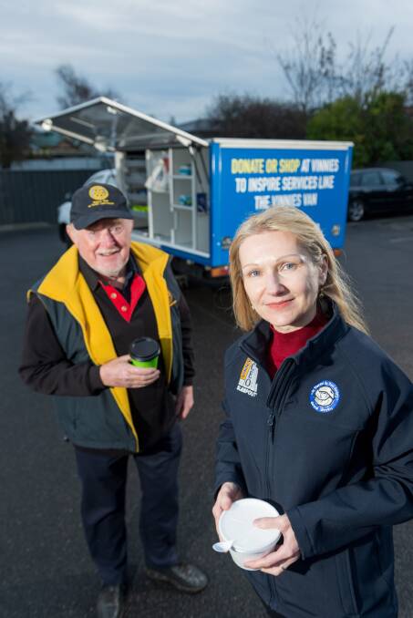 Food van volunteer and South Launceston rotarian Craig Mitchell and St Vincent de Paul Society Tasmania chief executive Lara Alexander. Picture: Phillip Biggs