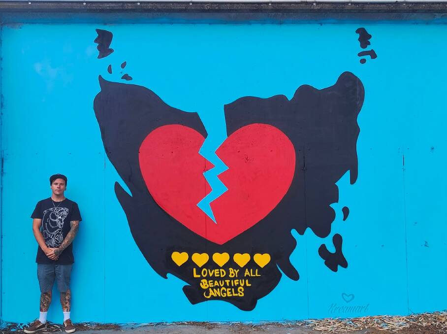 James Cown at the mural he painted. Picture: Supplied/Kreamart