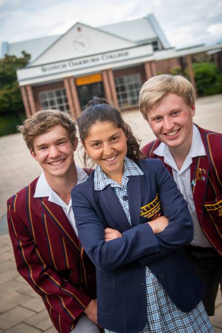 HIGH ACHIEVERS: Scotch Oakburn students Lachlan Stewart, Peta Antypas and Ethan Hamilton are all smiles after receiving their TCE results. Picture: Paul Scambler