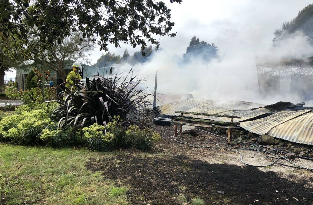 Firefighters act to investigate the cause of the fire, which remained unknown such was the destruction. Picture: Supplied