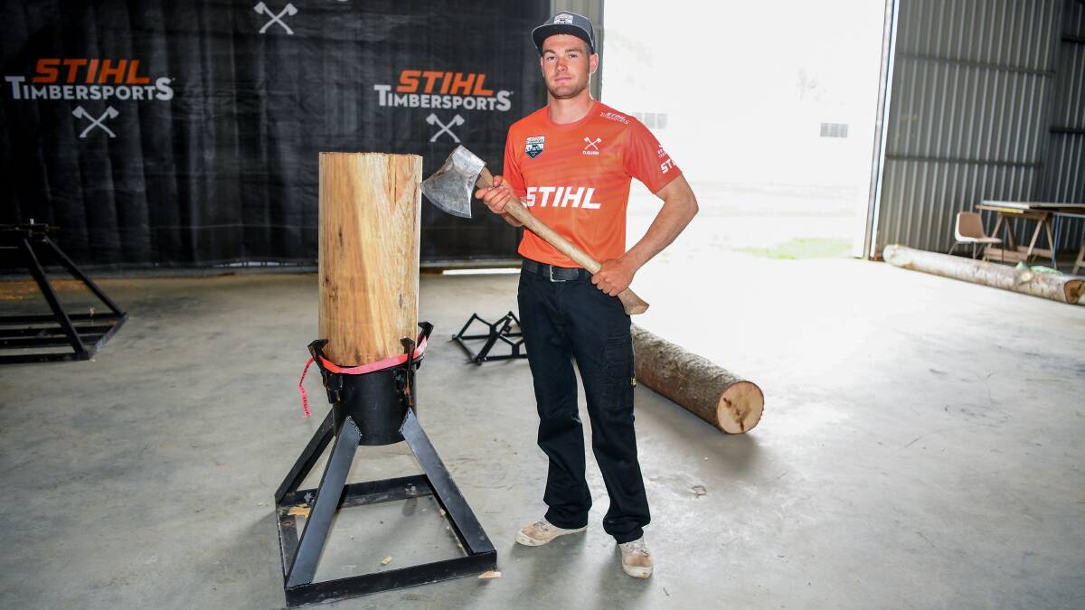 Dan Gurr sizes up a log ahead of the Stihl Timbersports Australian Woodchopping Championships. Picture: Neil Richardson The Examiner.