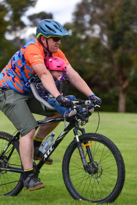 Launceston Dad Justin Stevens takes his daughter Alice with him on some of his rides. Picture: Paul Scambler The Examiner.