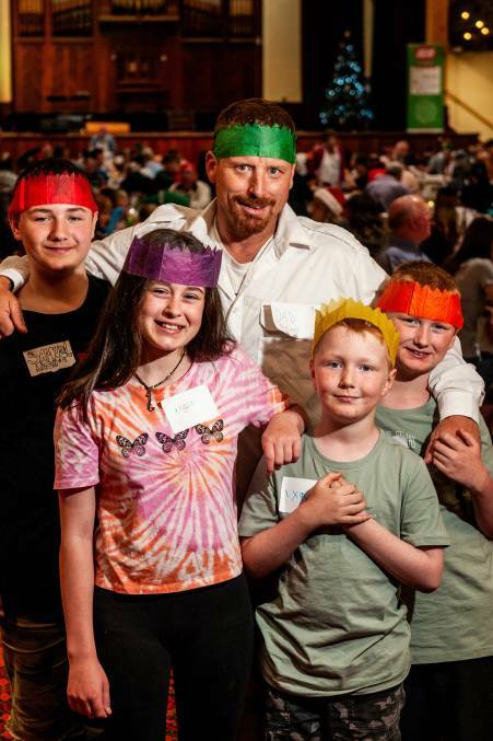 Heath Nash with children Samuel, Angel, Xavier and Saxon at last year's Community Christmas lunch at Albert Hall. Picture: Phillip Biggs