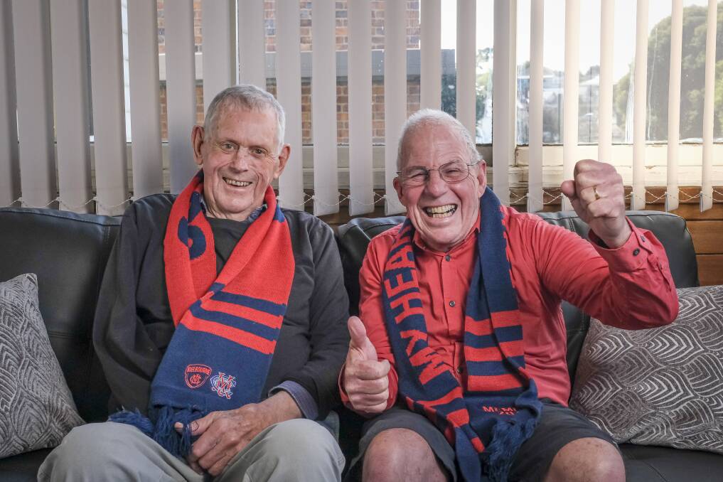 HOPEFUL: Lifelong Melbourne Demons fans Stan Plummer, 88, and Malcolm Cowan, 63. Picture: Craig George
