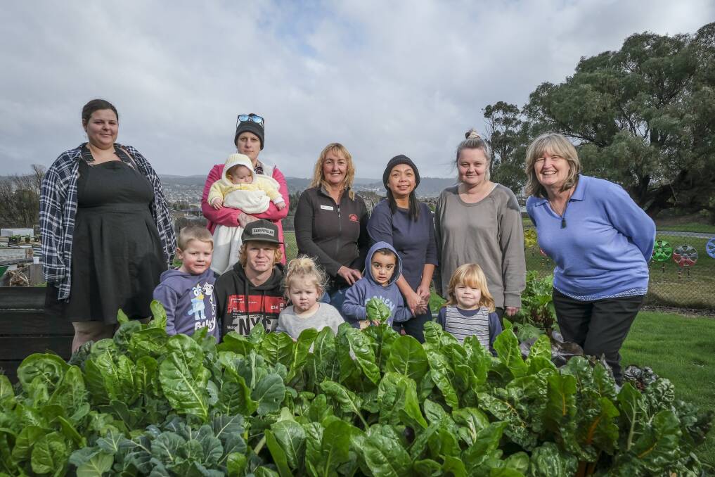 FOOD SECURITY: Volunteers and participants of a Northern Suburbs Community Centre program with centre general manager Trish O'Duffy (right). Picture: Craig George