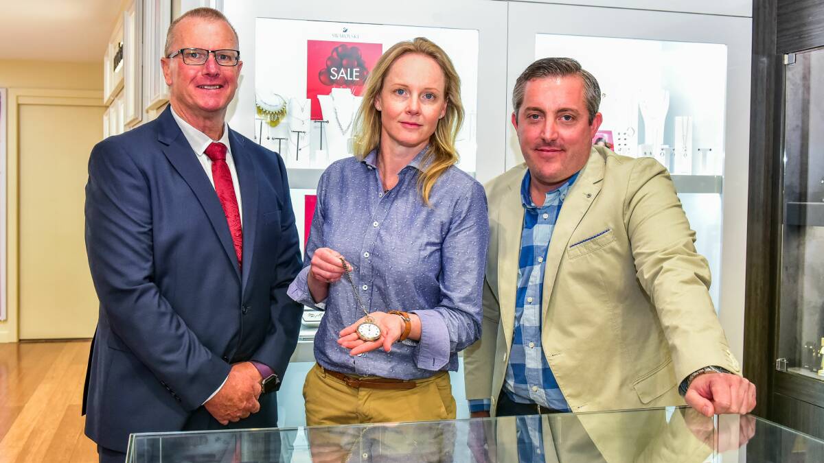 REVIEW: Launceston Chamber of Commerce chief executive Neil Grose, Building and Construction Minister Sarah Courtney and Jim Hughes and Son's Robert Turner with watch that has not been collected for years. Picture: Neil Richardson