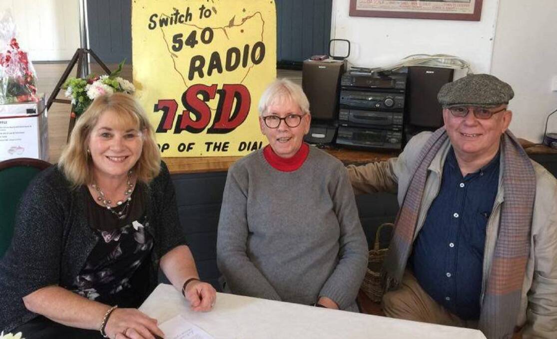 THROWBACK: Tanya Rattray with Sue Salier, the original 7SD cookbook organiser, and Ian Thompson at Sunday's book launch. Nearly 400 books have been reprinted. Picture: Supplied