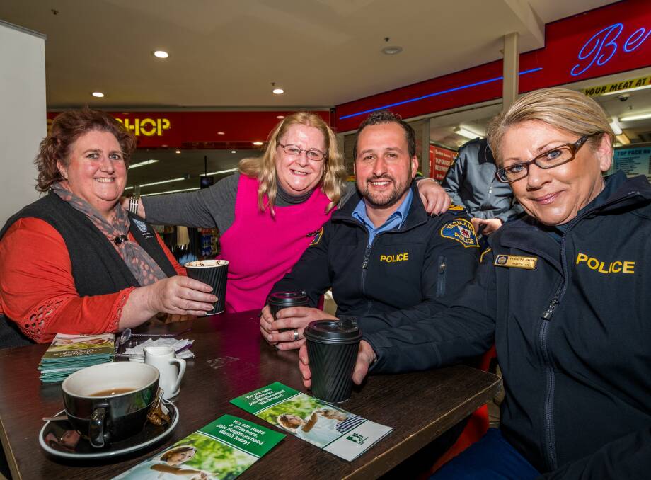 CHAT: Neighbourhood Watch's Jan Dunsby, and Sally Rubock, with Tasmania Police's Dean McMahon, and Inspector Philippa Burk. Picture: Phillip Biggs
