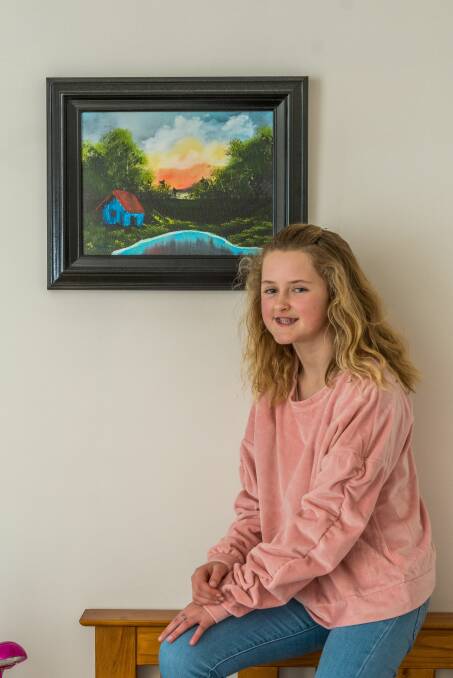 Marley and another of her Bob Ross Studio pieces. 