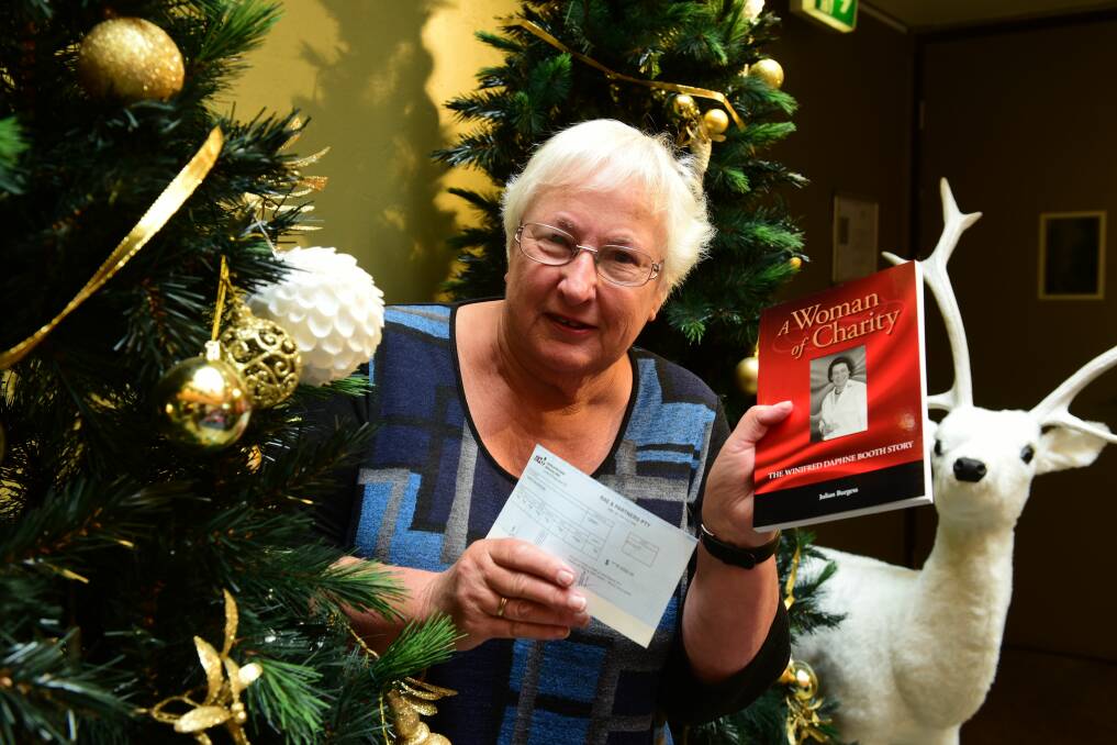 KIND: W.D Booth Charitable Trust trustee Jill Dearing with a $12,000 cheque for The Examiner's Empty Stocking Appeal. Picture: Paul Scambler.