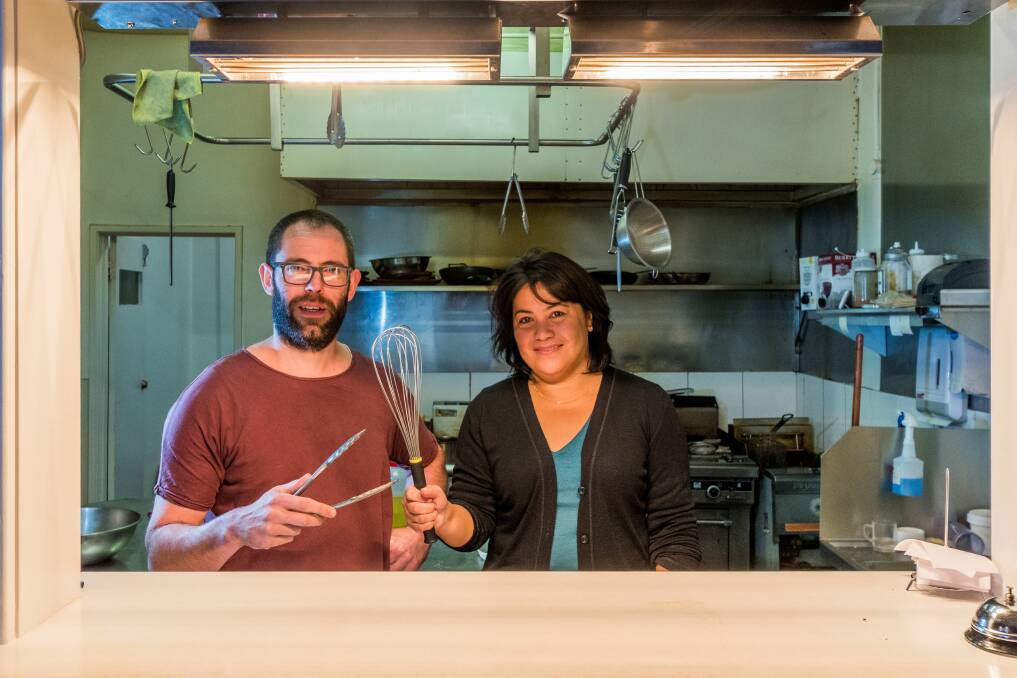LAST CHANCE: Inveresk Tavern owner Charlie Rayner and Migrant Resource Centre North chief executive Ella Dixon prepare for the last Community Kitchen event of 2018 which will be held on Sunday. Picture: Phillip Biggs
