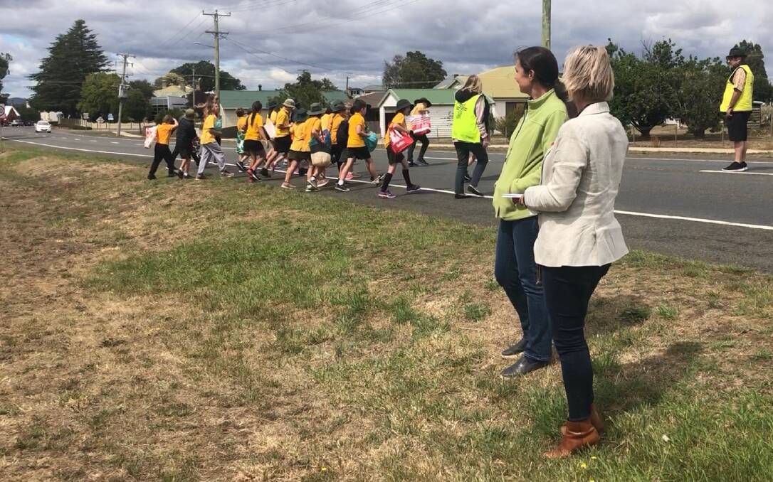 WORRIED: Bass Labor MHA Jen Butler and Campbell Town District School chairwoman Isabelle Atkinson watch as children cross the Midland Highway. Picture: supplied.