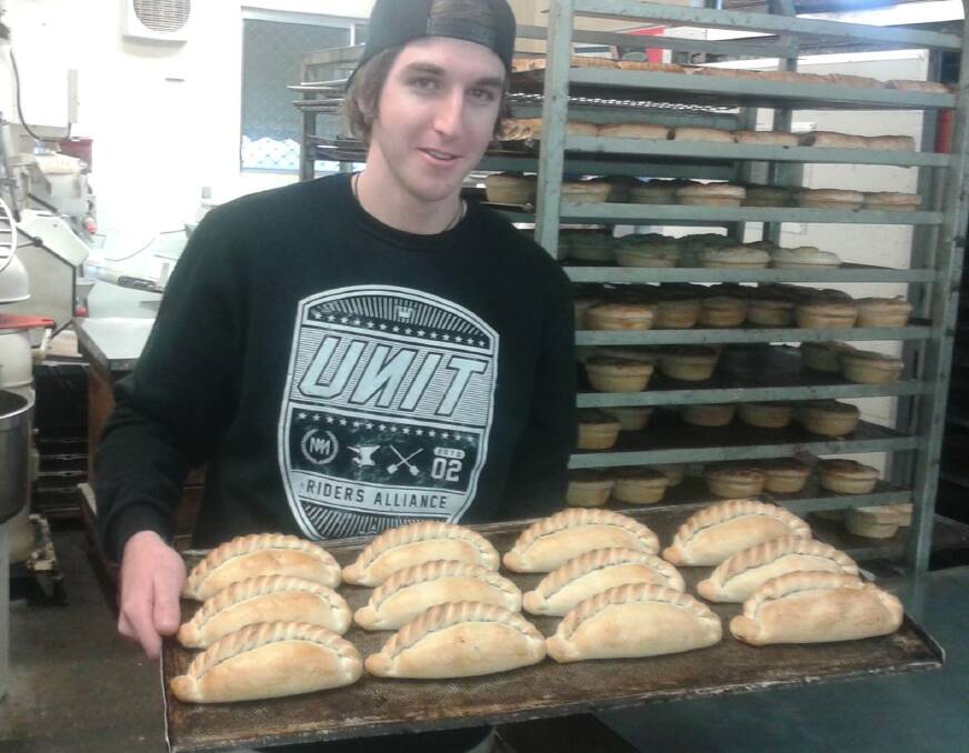 WINNERS: Cottage Bakery apprentice Kiarn Davis with his traditional pasties, which won bronze at the national bakery competition in Melbourne. The bakery won nine awards in total. Picture: supplied.