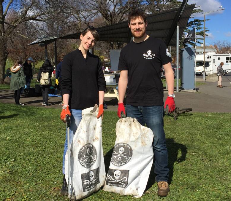 CLEAN-UP: Amy and Tom Dillion, of Launceston, were just some of the 150 people to help clean up the Tamar River on Friday. Picture: Tarlia Jordan